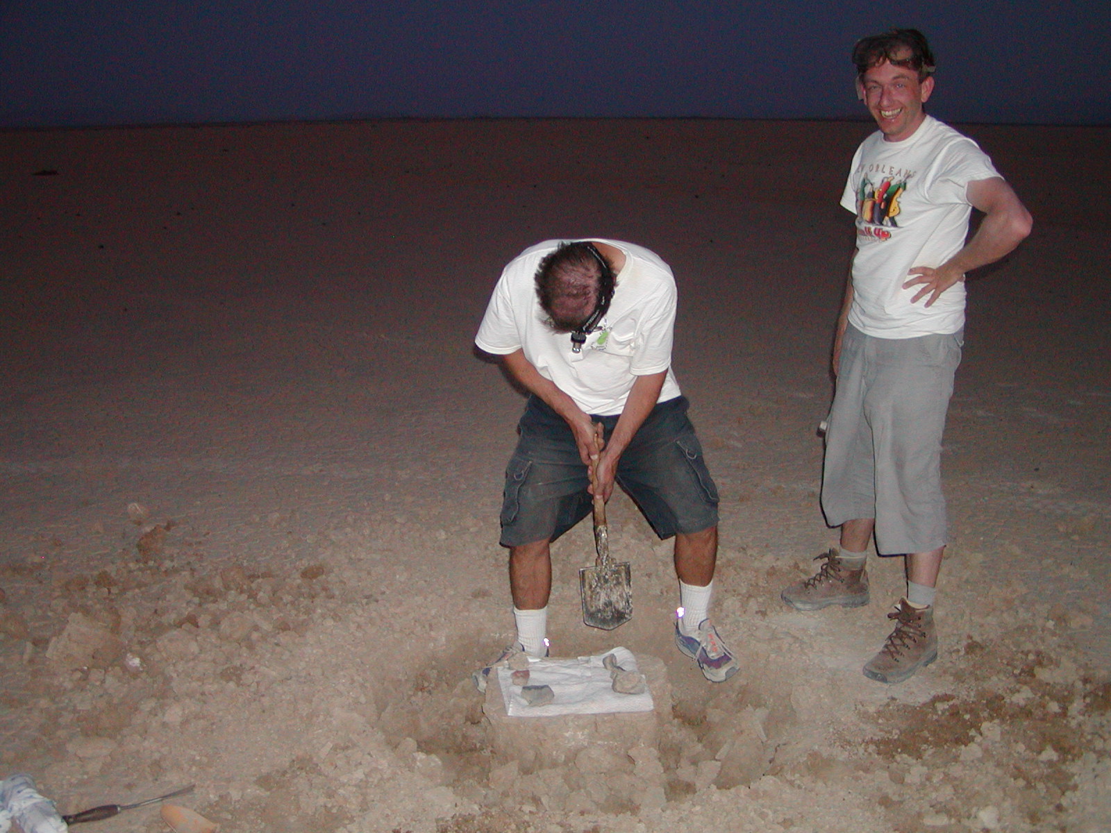 Heinz Huber (then at UCLA) and Peter excavating the meteorite.